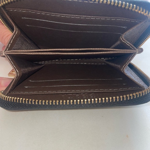 Prada wallet 
Color : Black
Condition : Slightly used - Picture 4 of 4